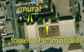 4/7 City centre of a large city with two murals (artwork_type=mural and tourism=artwork), recognisable because they have the shape of a wall that leaves a shadow, with nothing around it, and a tower of immortality (historic=memorial and memorial=immortality_tower), with its shadow cast on the ground, (Maxar satellite imagery). One of the murals was added after 2011, the year Kim Jong-il died.