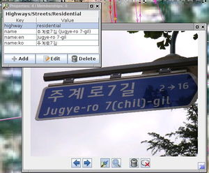 JOSM screenshot showing a street sign photo and properties window